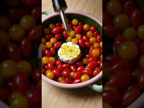 Slow roasted garlic and tomatoes with olive oil and balsamic glaze on toast with burrata